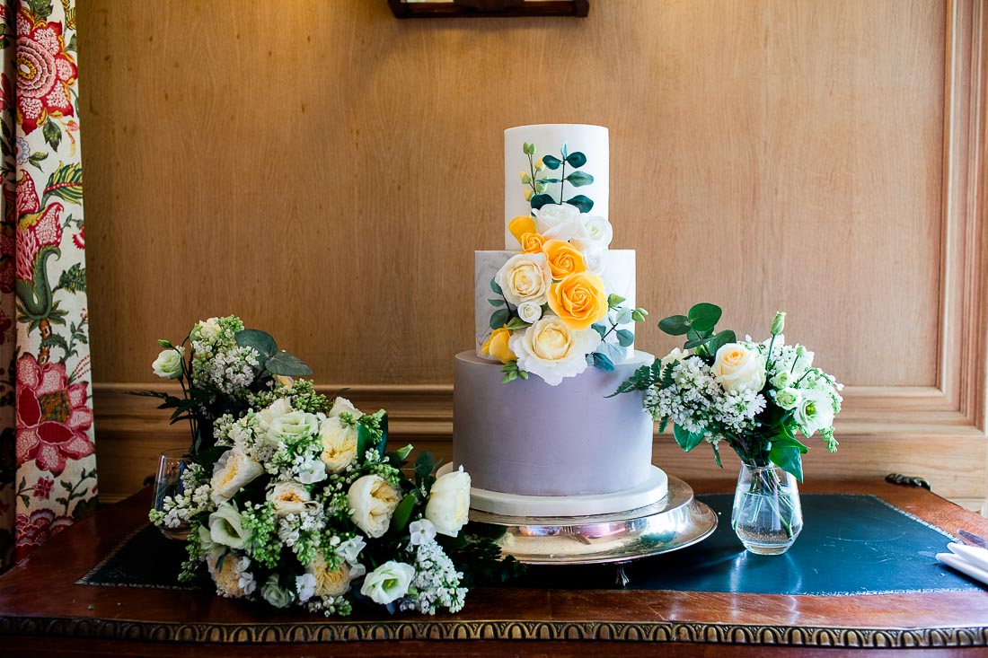 a wedding cake sits on a table