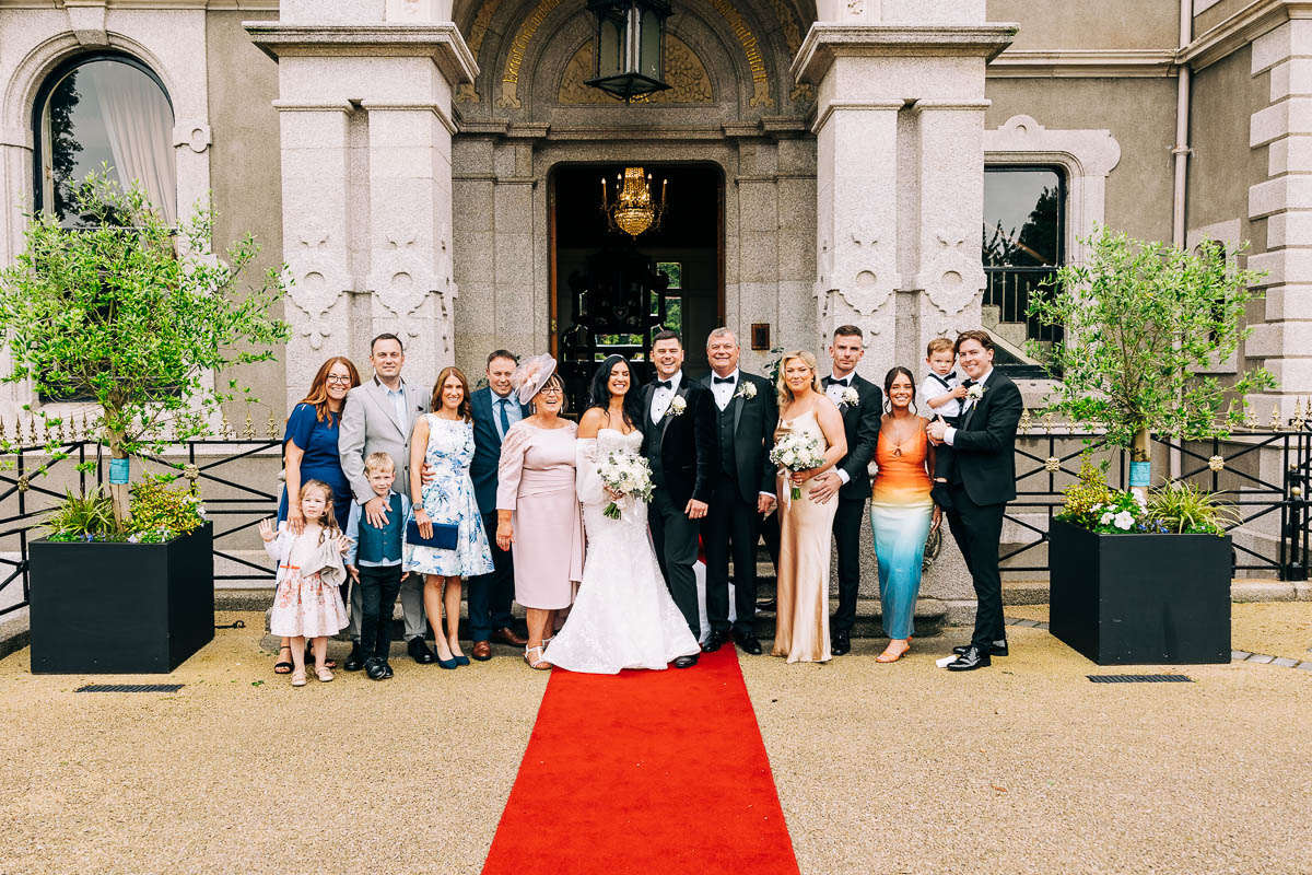 Wedding day family photograph outside the Manor House at the killashee hotel