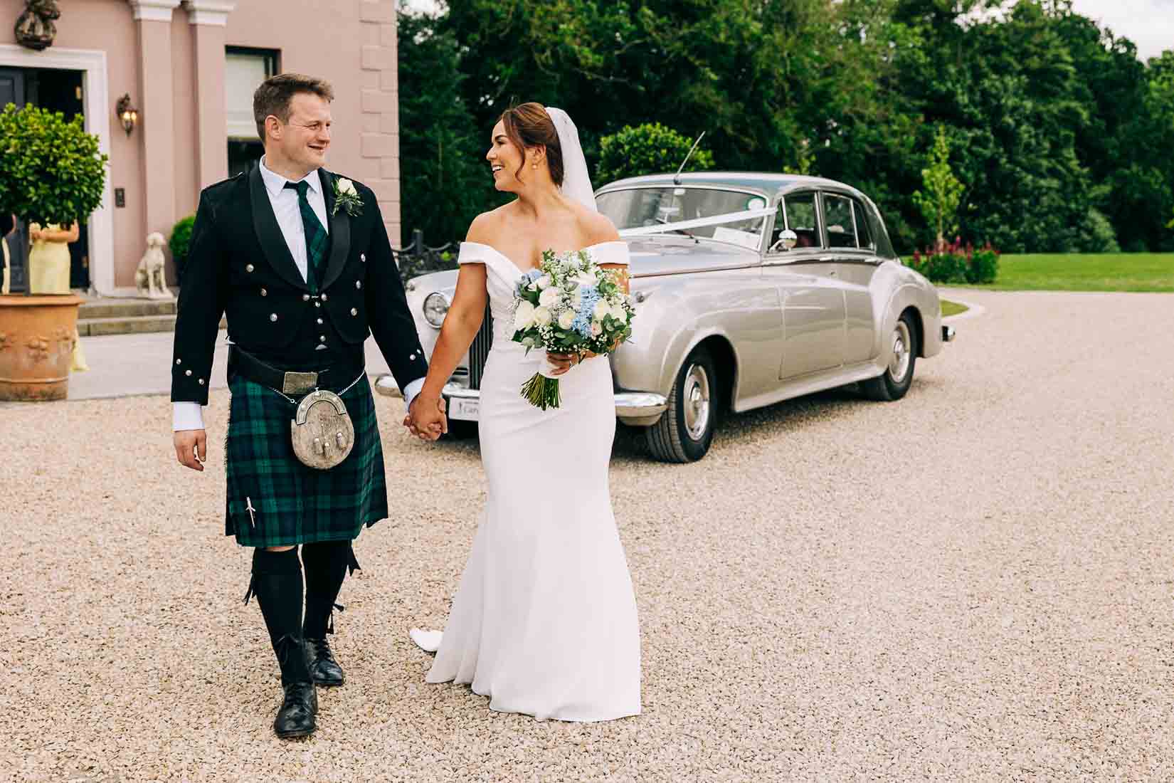 bride and groom outside Boyne Hill House