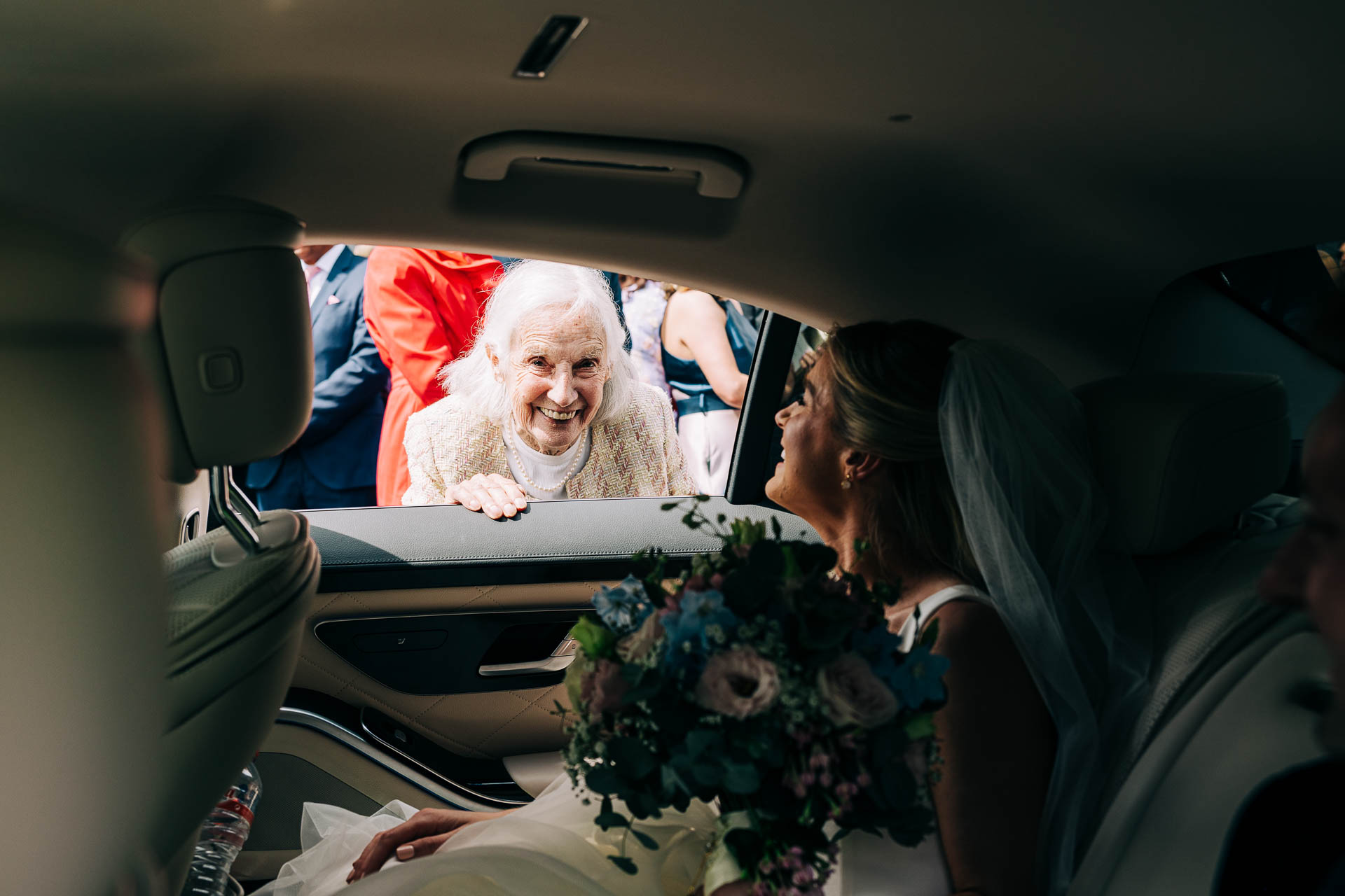 brides granny simles at her granddaugther on her wedding day in Castle Durrow