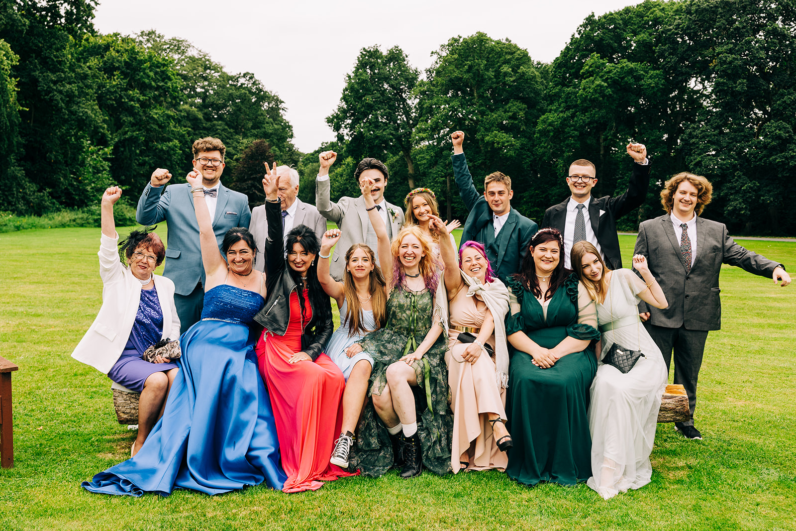Magdalena & Ronan | Martinstown House family photo on the lawn at Martinstown House bride and groom with family seated in front